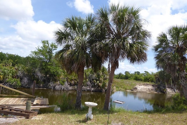 328 Baytree Dr, Rotonda West, FL 33947 - dock with a water view