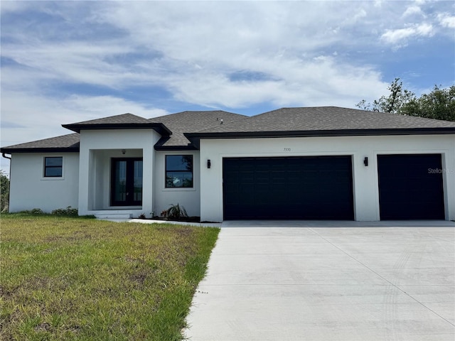 7330 Printer St, Port Charlotte, FL 33981 - view of front of home featuring concrete driveway, a garage, french doors, a front lawn, and stucco siding