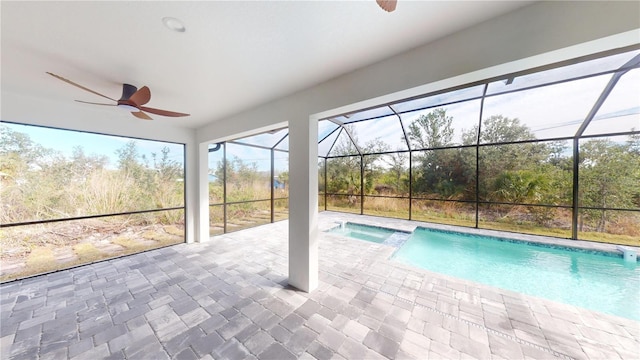 7330 Printer St, Port Charlotte, FL 33981 - view of pool featuring a ceiling fan, a patio area, a pool with connected hot tub, and a lanai