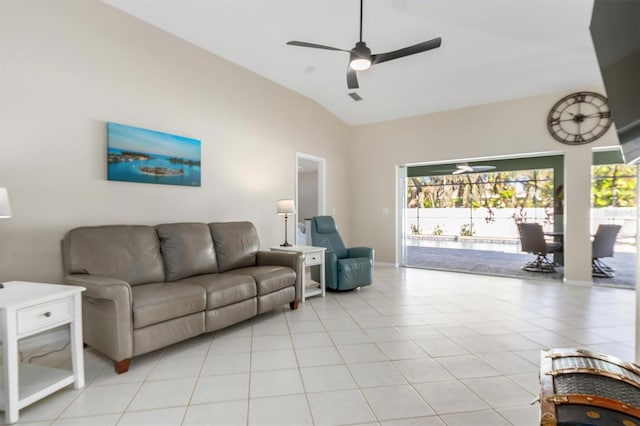 tiled living room with ceiling fan and lofted ceiling