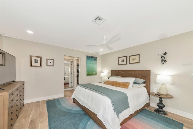 bedroom with ceiling fan and light wood-type flooring