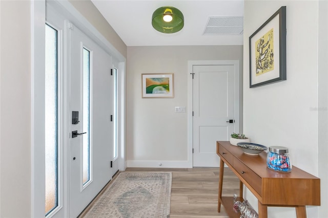 entryway with light wood-type flooring