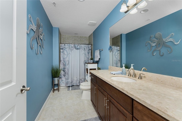 bathroom featuring curtained shower, tile patterned floors, a textured ceiling, toilet, and vanity