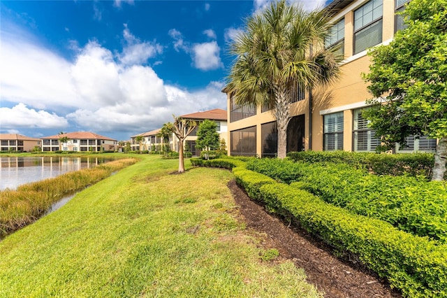 view of yard featuring a water view