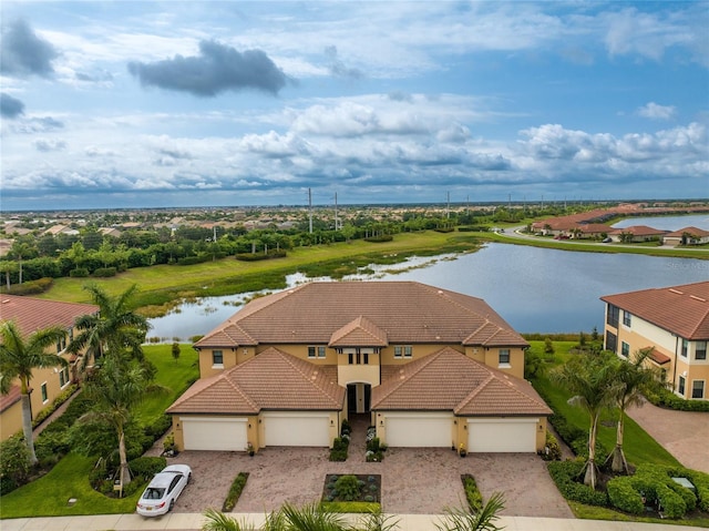 drone / aerial view with a water view