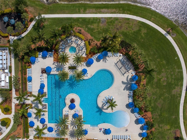 birds eye view of property with a water view