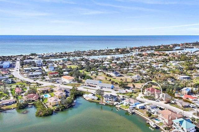 drone / aerial view featuring a water view