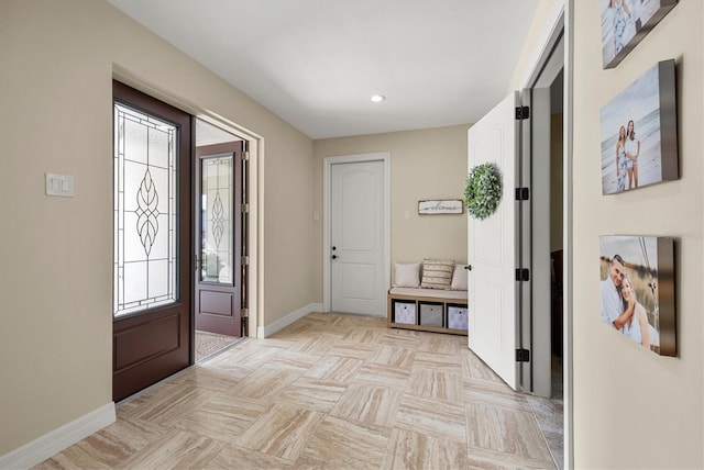 foyer featuring light parquet flooring