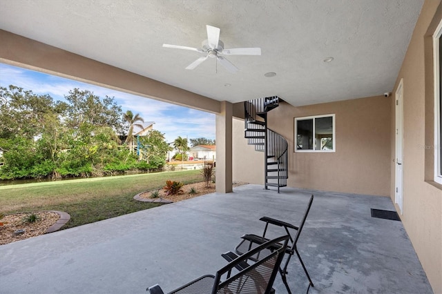 view of patio / terrace with ceiling fan