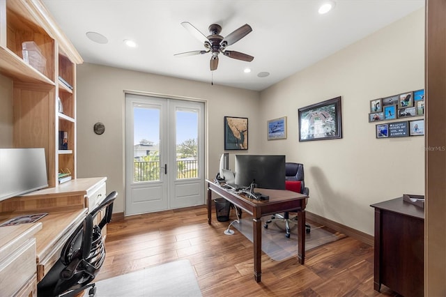 office featuring ceiling fan, dark wood-type flooring, and french doors