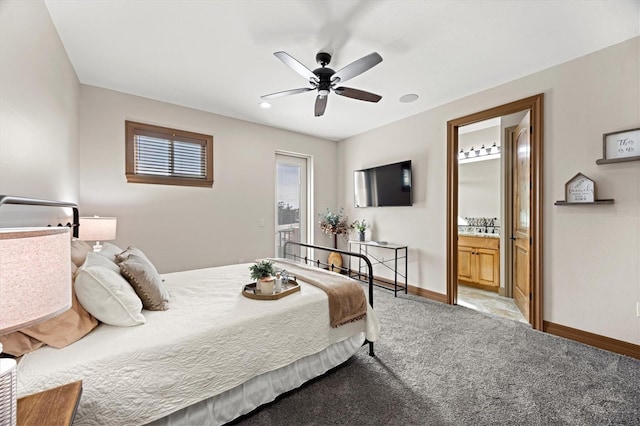 bedroom featuring carpet, ensuite bath, and ceiling fan