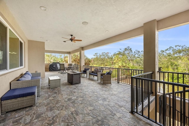 view of patio / terrace with ceiling fan, an outdoor hangout area, and grilling area