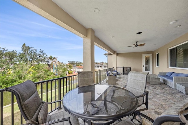 exterior space with outdoor lounge area and ceiling fan