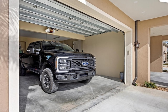 garage featuring a garage door opener