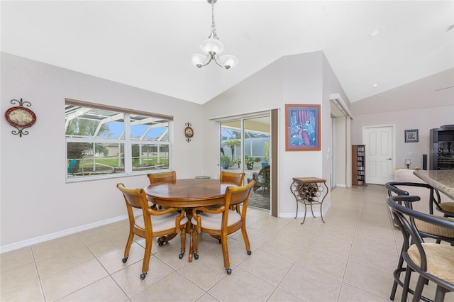 dining room with light tile patterned flooring, vaulted ceiling, and a notable chandelier