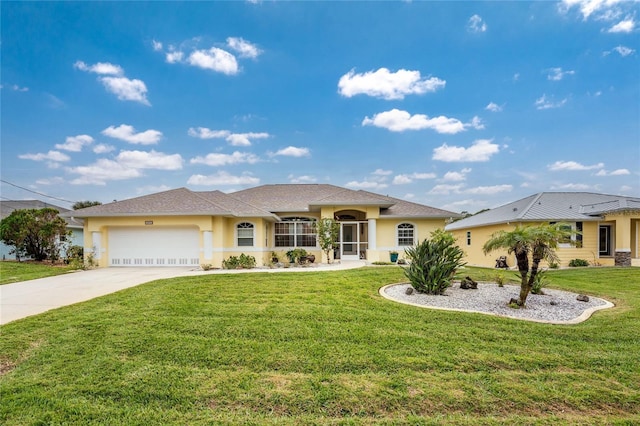 view of front of house featuring a front yard and a garage