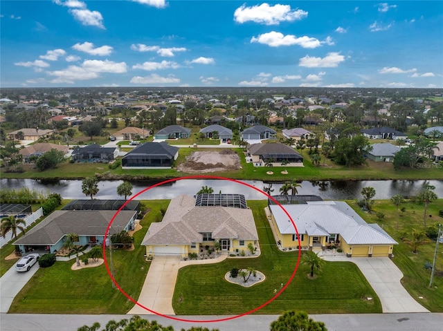 drone / aerial view featuring a water view