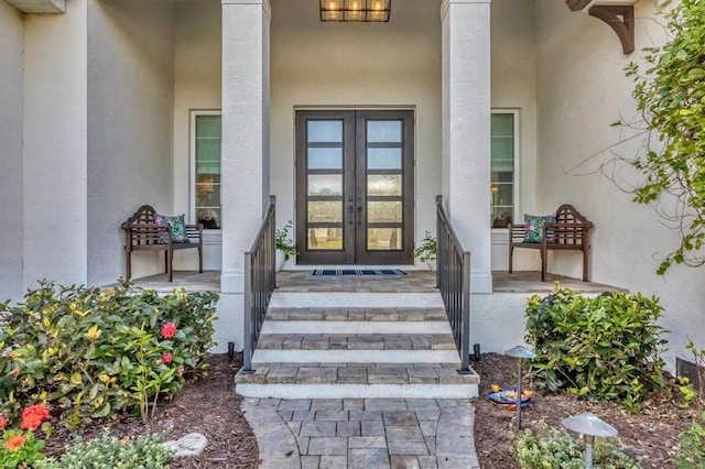 entrance to property featuring french doors