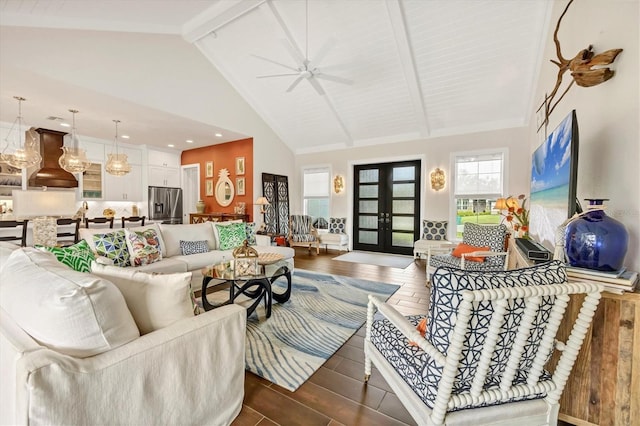 living room with beamed ceiling, ceiling fan, high vaulted ceiling, and french doors