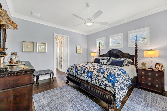 bedroom with ensuite bath, crown molding, and ceiling fan