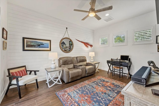 living room featuring ceiling fan