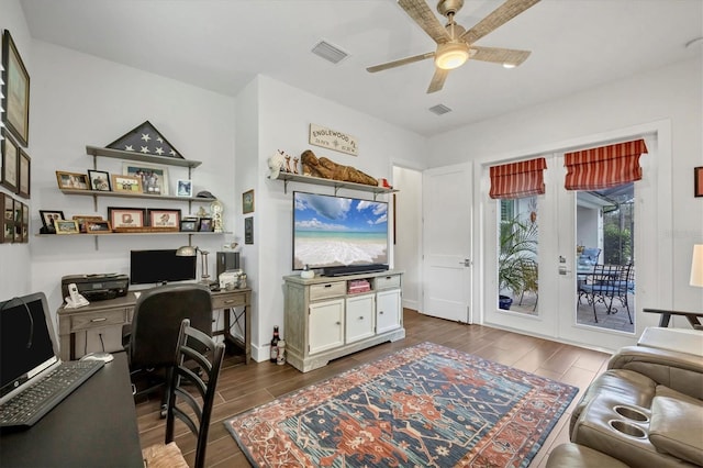 office area featuring french doors and ceiling fan