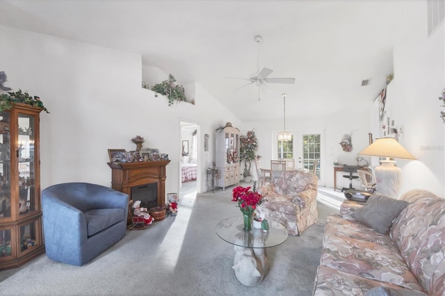 living room with light carpet, high vaulted ceiling, and ceiling fan