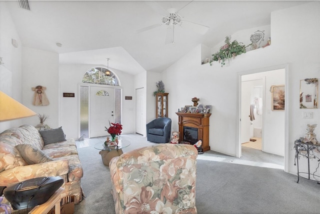 living room featuring light carpet, high vaulted ceiling, and ceiling fan