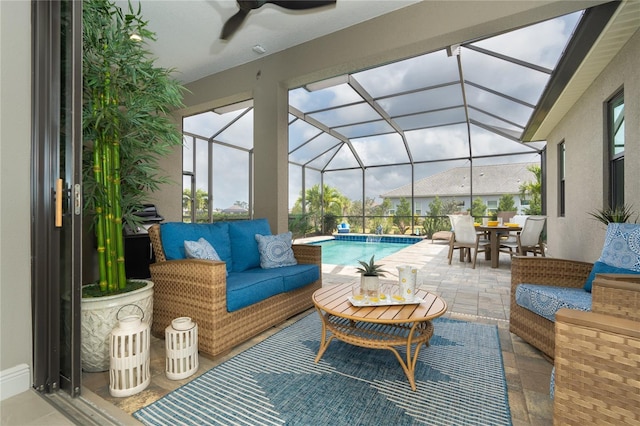 view of patio / terrace featuring outdoor lounge area and a lanai