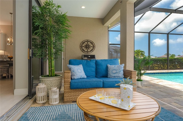 view of patio / terrace featuring an outdoor living space and a lanai