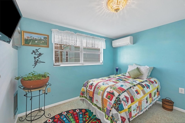 bedroom with a wall mounted air conditioner