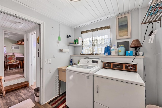 washroom featuring dark hardwood / wood-style flooring, separate washer and dryer, ceiling fan, and wooden ceiling