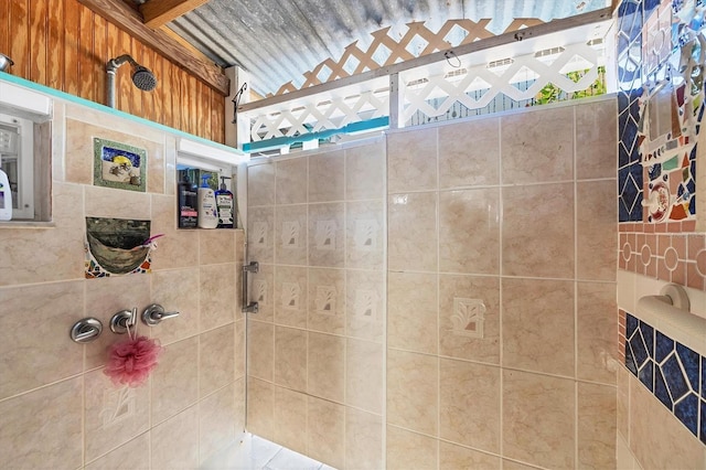 bathroom with tiled shower