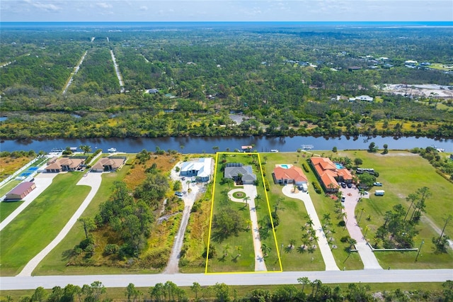 aerial view featuring a residential view and a water view