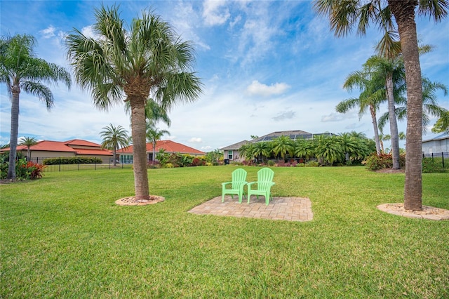 view of yard with a patio and fence