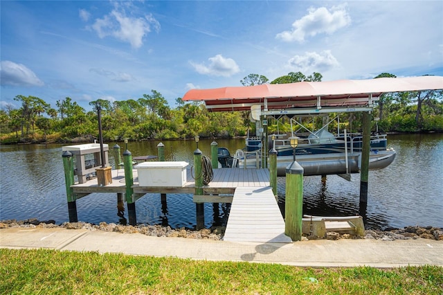 view of dock featuring a water view and boat lift