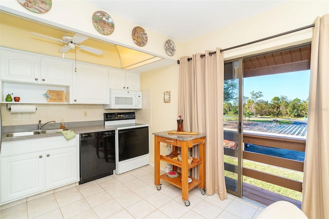 kitchen featuring tasteful backsplash, white appliances, ceiling fan, sink, and white cabinets