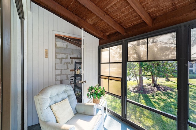 sunroom / solarium featuring vaulted ceiling with beams and wood ceiling