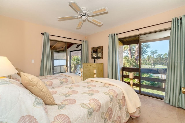 carpeted bedroom with ceiling fan, access to outside, and multiple windows