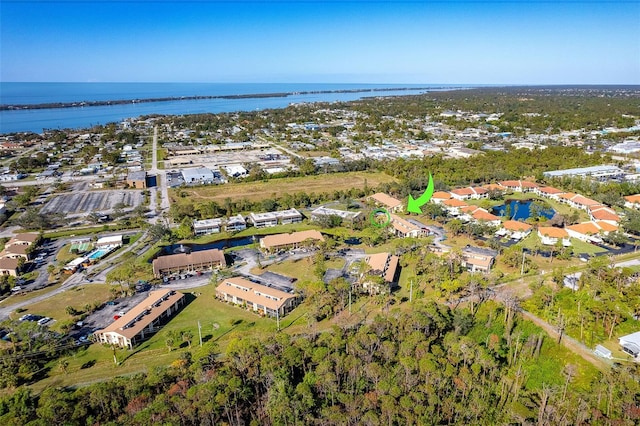 drone / aerial view with a water view