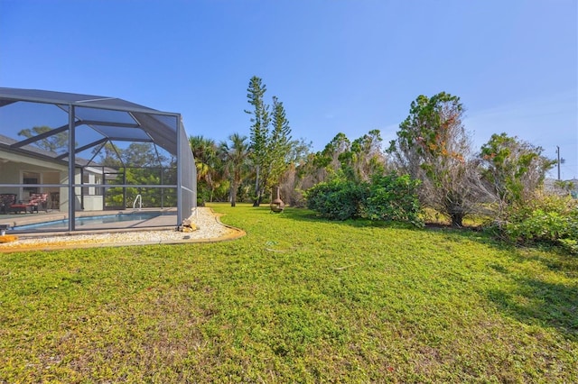 view of yard featuring a lanai