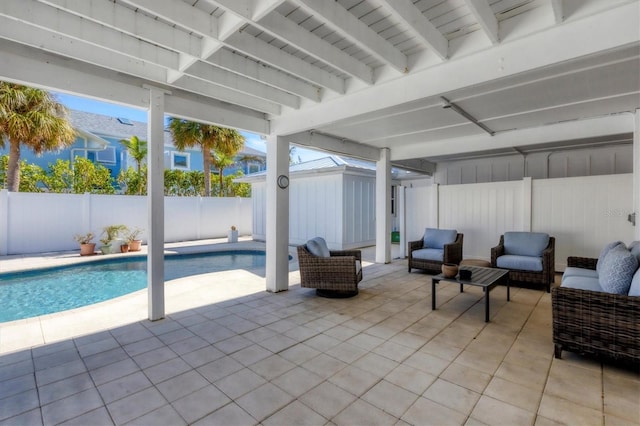 view of patio featuring a fenced in pool and an outdoor hangout area