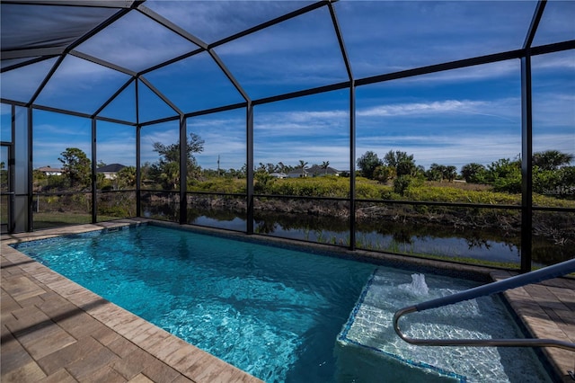 view of pool with a lanai, a water view, and a patio