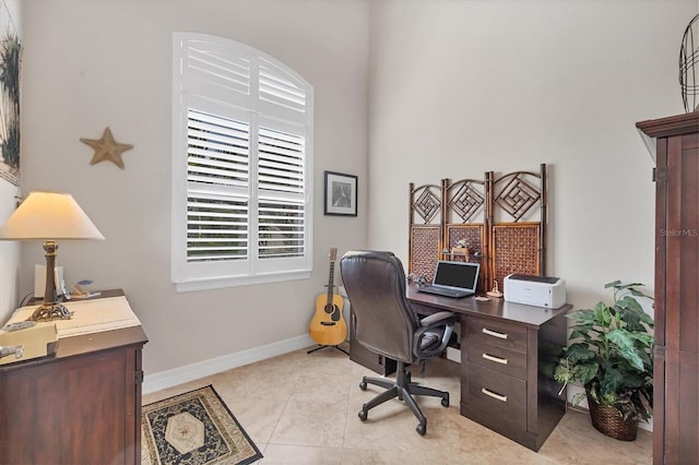 office with light tile patterned floors