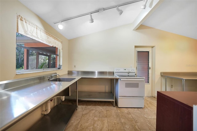 kitchen featuring stainless steel counters, electric stove, sink, and vaulted ceiling