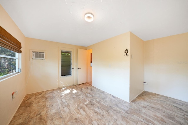 empty room featuring a wall mounted AC