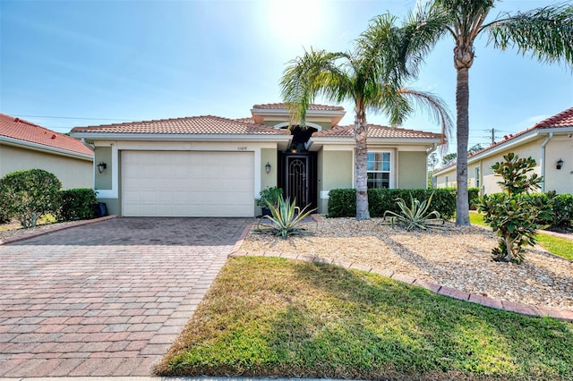 11479 Blackfin St, Venice, FL 34292 - mediterranean / spanish home with a garage