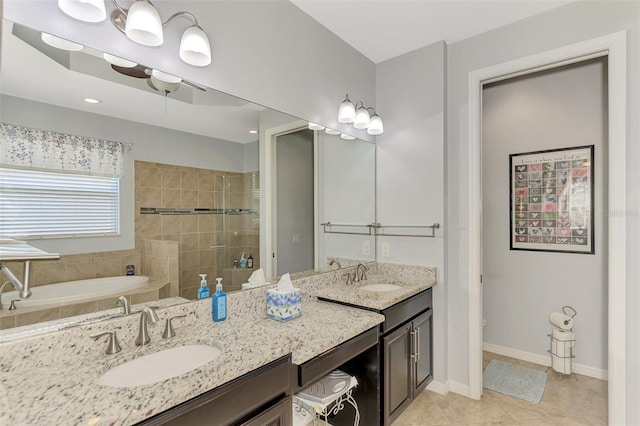 bathroom with tile patterned floors, vanity, and plus walk in shower