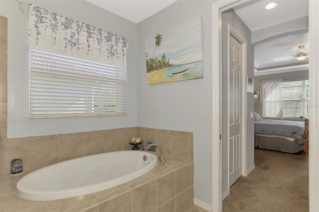 bathroom with tiled tub