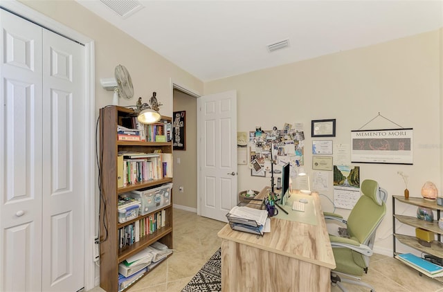 office with light tile patterned floors